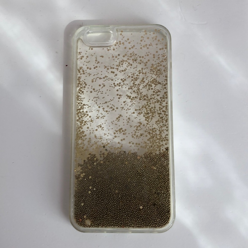 iPhone 6 case with and gold glitter that moves.